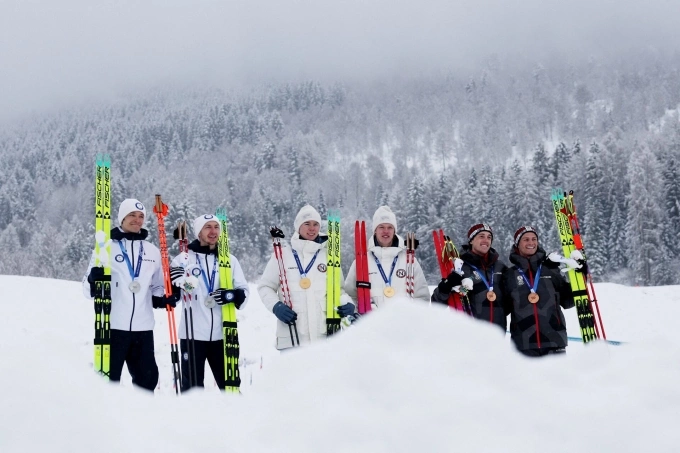 [Caption][1/2]Milano Cortina 2026 Olympics - Nordic Combined - Team Sprint, Victory Ceremony - Tesero Cross-Country Skiing Stadium, Lago, Italy - February 19, 2026. Gold medallists Andreas Skoglund of Norway and Jens Luraas Oftebro of Norway celebrate after winning the Team Sprint, with silver medallists Ilkka Herola of Finland and Eero Hirvonen of Finland and bronze medallists Stefan Rettenegger of...Purchase LicensingRights